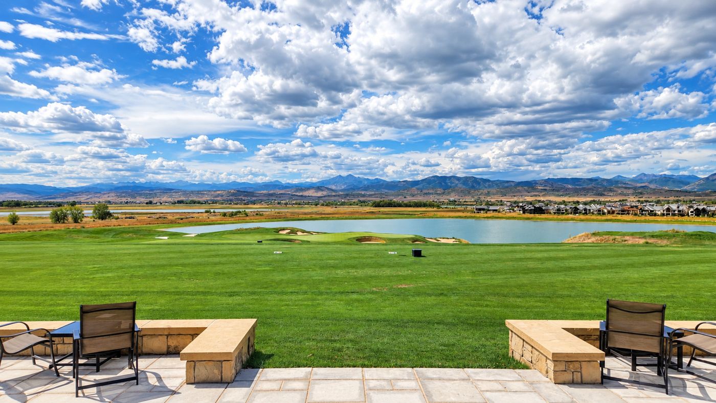 Clubhouse patio overlooking the TPC Colorado course, lake and Front Range
